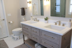 An accessible shower with new tiling and installed grab bars by Prestige Remodeling Solutions in Jackson, TN.