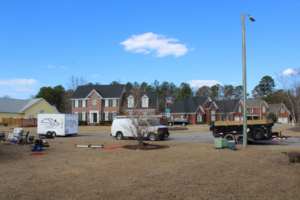 Advanced Roofing Solutions, LLC trailer and equipment parked at a residential job site in Blountville, TN.