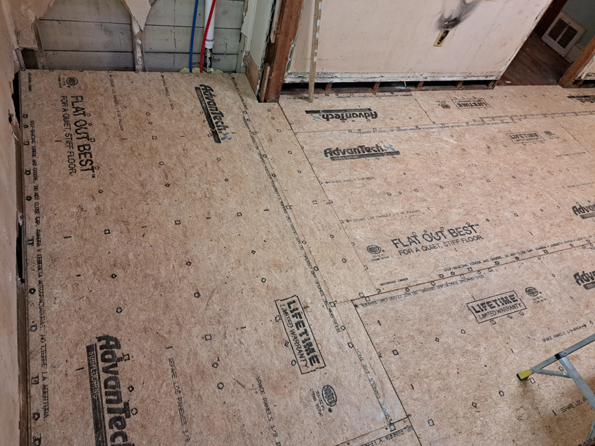 New Advantech subfloor panels installed in a room during renovation by Vest Home Services LLC in Greenville, SC.