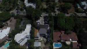 An aerial view of a residential construction project with roof framing visible by Intelligent Construction Inc. in Miami, FL.