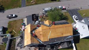 An aerial view of a roof being stripped and new underlayment installed by Joe's Roofing in Strongsville, OH.
