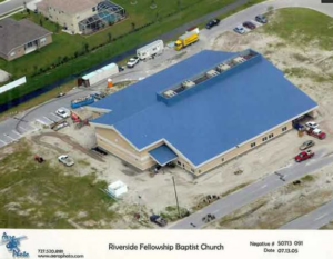 An aerial view of a large church building under construction, a project managed by Walker Design & Construction Co. in Boca Raton, FL.