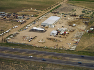 An aerial view of the extensive concrete facility and material yard for Arco Concrete Inc in Fort Lupton, CO