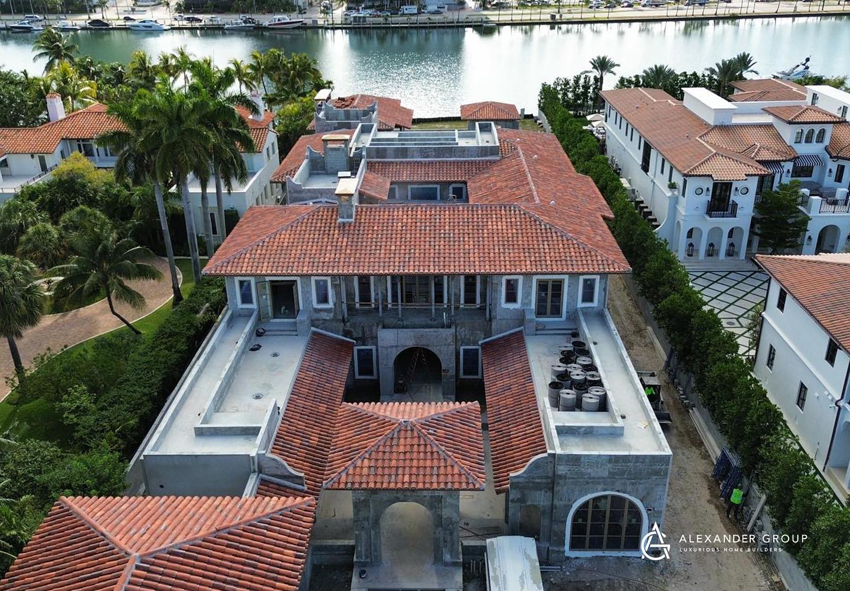 An aerial view of a luxury home construction project with a central courtyard by Alexander Group Construction in Miami, FL.