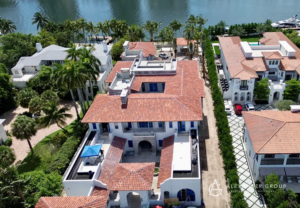 An aerial view of a luxury residential construction project by Alexander Group Construction in Miami, FL, near the waterfront.