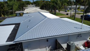 An aerial view showcasing a recently completed metal roof installation by Florida Roof & Building Services LLC in Ellenton, FL.