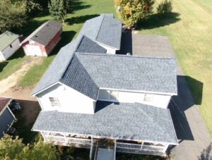 An aerial view showcasing a newly installed roof on a residential property by M&V Home Solutions Inc in Elgin, IL