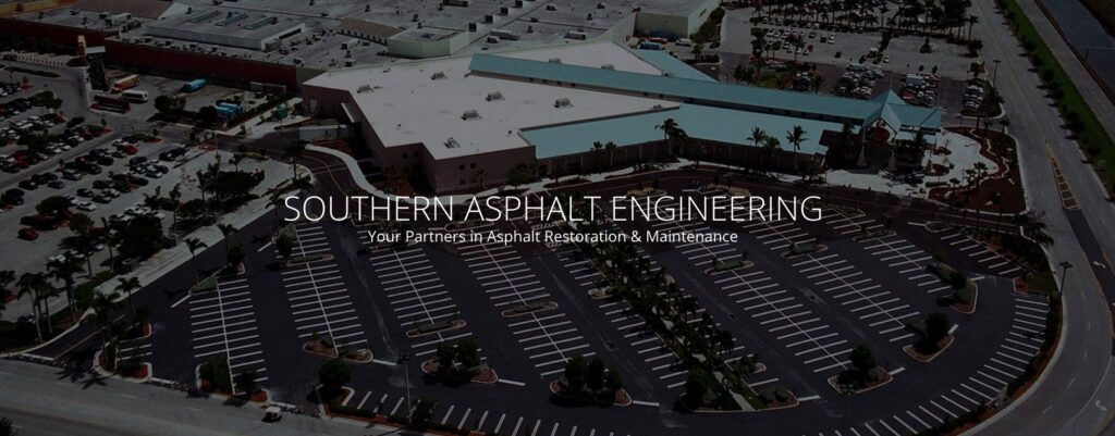 Aerial view of a newly paved and striped commercial parking lot completed by Southern Asphalt Engineering in Miami, FL.