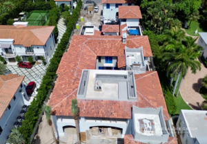 An aerial view of roof construction and rooftop features on a luxury home by Alexander Group Construction in Miami, FL.