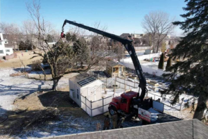 An aerial view of Broken Branch Tree Removal performing tree removal services in Broadalbin, NY.