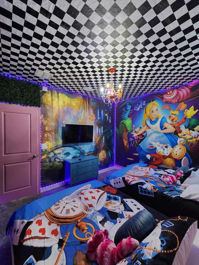 An Alice in Wonderland themed child's bedroom renovation with custom murals and a checkered ceiling by Dr.House in Orlando, FL