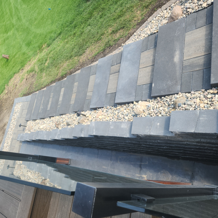Angled view of newly installed paver steps and walkway by Great Plains Remodeling and Handyman Services in Mitchell, SD.