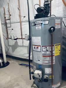 A large A.O. Smith water heater professionally installed by Read Plumbing LLC in Ankeny, IA.