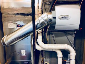 An Aprilaire whole-home humidifier installed with ductwork by Cold Comfort HVAC Services, LLC in Rockville, MD.