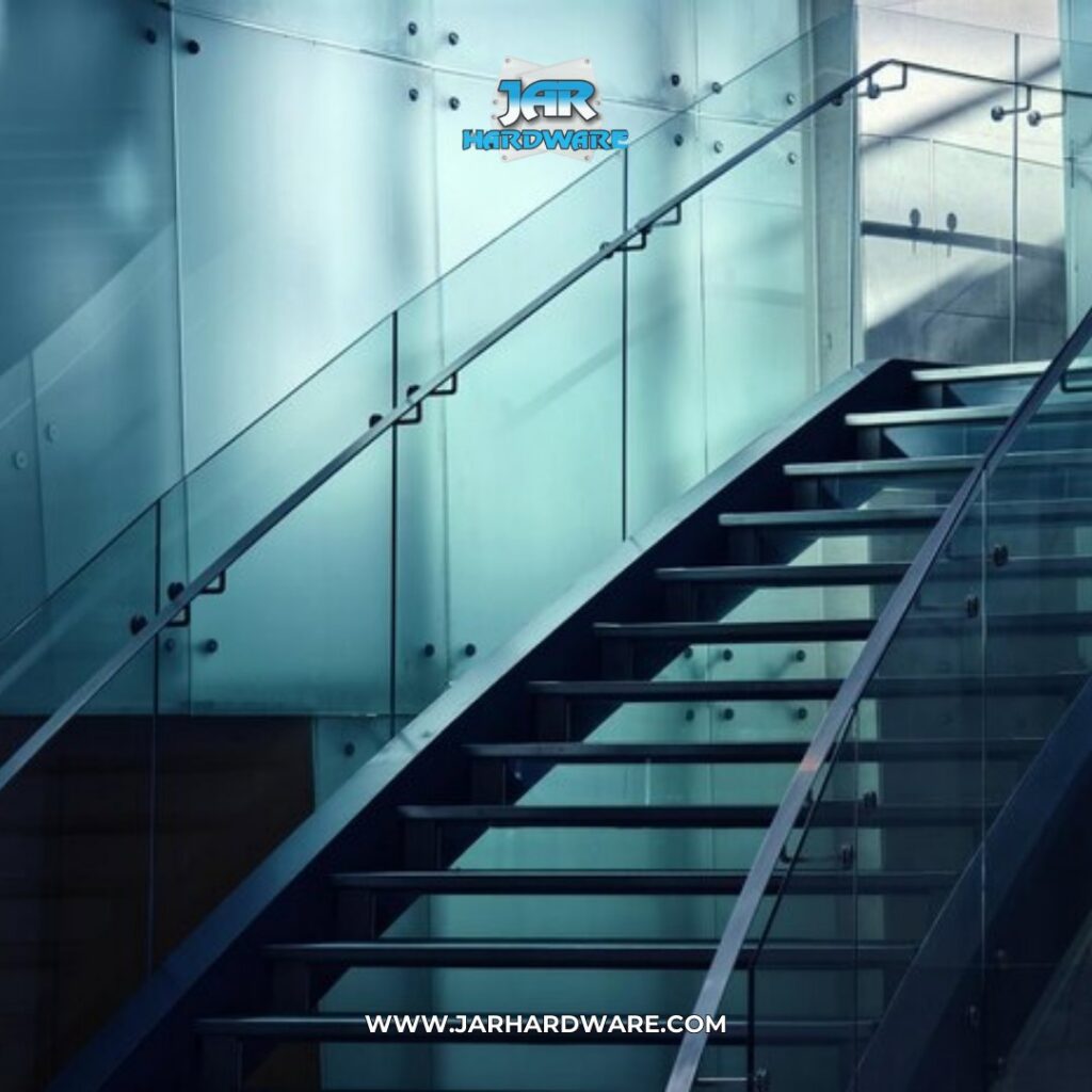 Modern interior design featuring a glass staircase and glass wall partitions installed by Jar Hardware in Hialeah, FL.