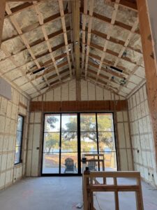 Attic ceiling and walls with spray foam insulation in new construction by IFOAM Insulation of Hill Country in San Antonio, TX