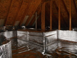 Insulated ductwork and reflective insulation installed in an attic by Indoor Environmental Systems in Cary, NC.