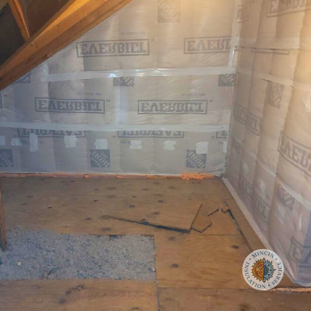An attic space with new insulation and a vapor barrier installed by Mincin Insulation Service Inc. in Pittsburgh, PA