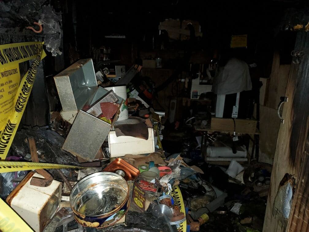 An attic space undergoing renovation, showing exposed wooden beams and new framing by J-BO Enterprises, Inc in Wilmington, MA.
