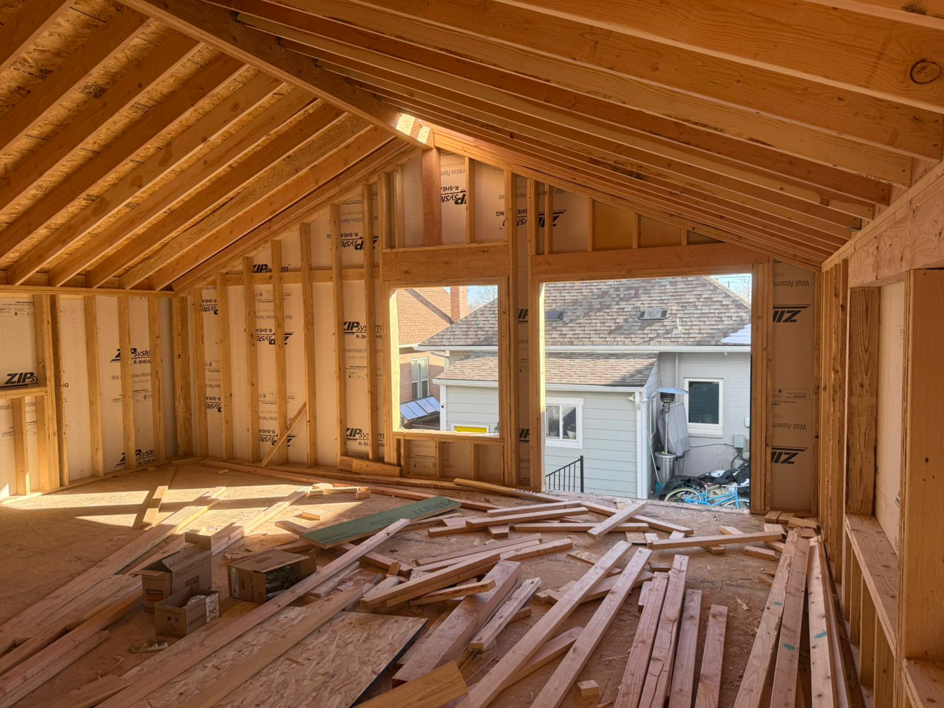 Attic room framing and renovation work in progress by Alex Home Pro Colorado, a handyman service in Denver, CO.