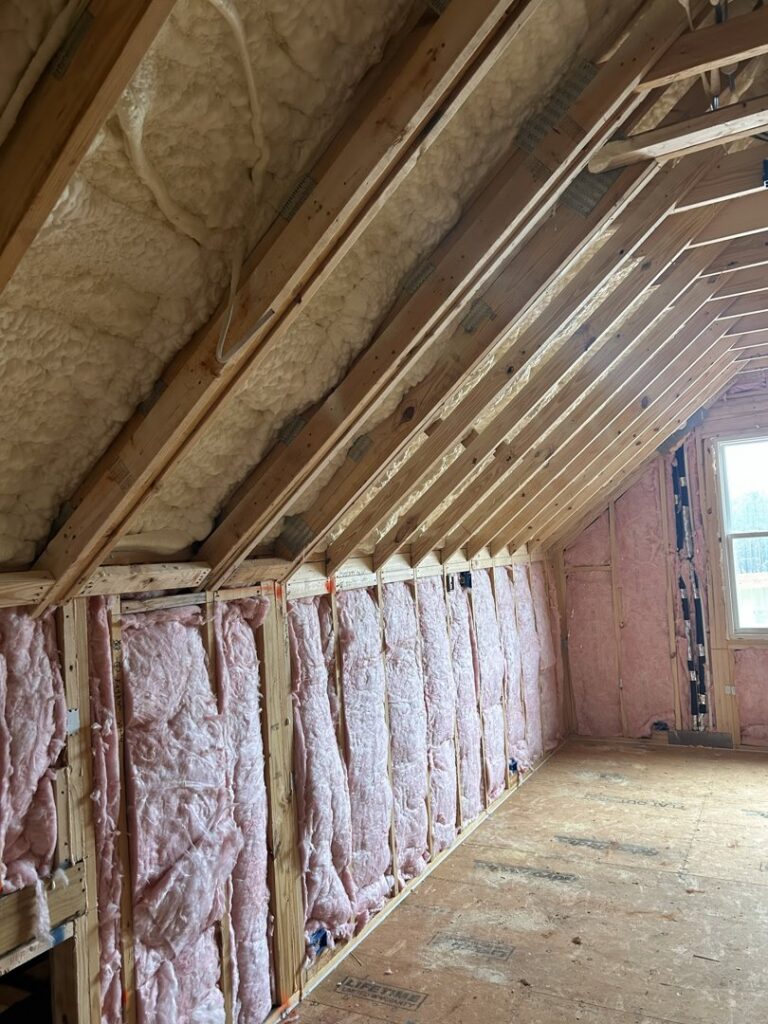 Spray foam and batt insulation installed in an attic room by Insulation By Cohen's in Moncks Corner, SC.