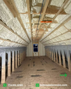 Attic space with new spray foam insulation applied to roof rafters and wall studs by BCI Insulation in Byron, GA