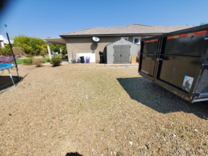 A residential backyard cleared of debris and yard waste after a successful junk removal service by V.S.C Junk Removal Services in Las Vegas, NV.