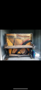 Backyard area with a shed and cleared ground, showing site prep by Port City Remove and Improve in Wilmington, NC