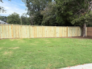 Backyard wood fence installation project completed by BZB Fencing & Staining in Fountain Inn, SC.