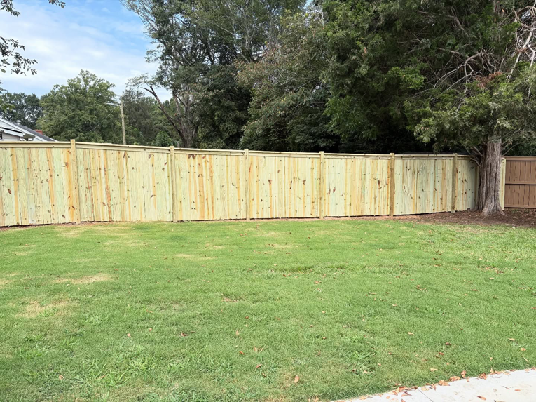 Backyard wood fence installation project completed by BZB Fencing & Staining in Fountain Inn, SC.