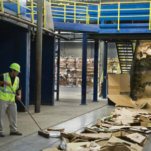 Large bales of recyclable materials at a waste processing plant, showcasing the end stage of junk removal services in Meridian, ID.