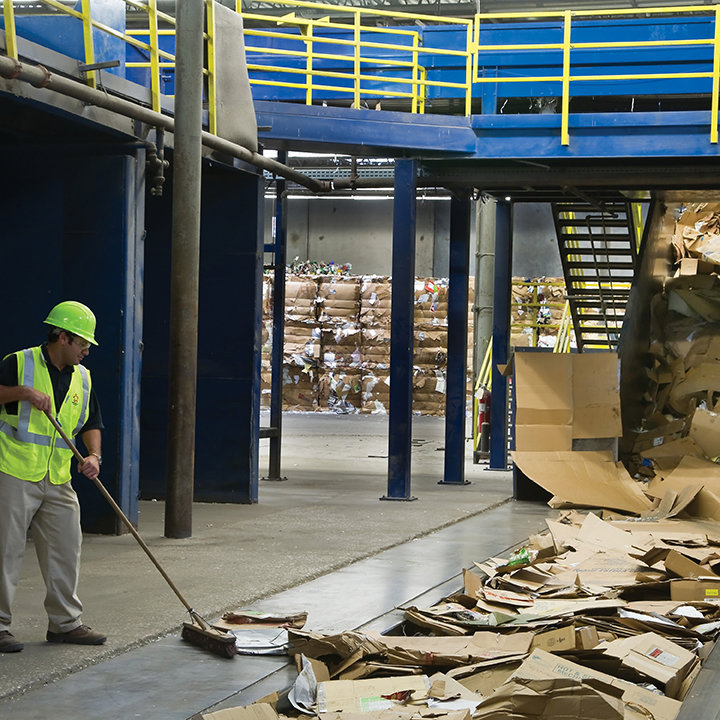 Large bales of recyclable materials at a waste processing plant, showcasing the end stage of junk removal services in Meridian, ID.