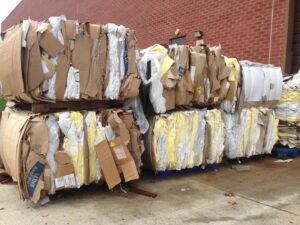 Bales of compressed cardboard and recycling materials handled by Green Street Services in Woodbridge Township, NJ.