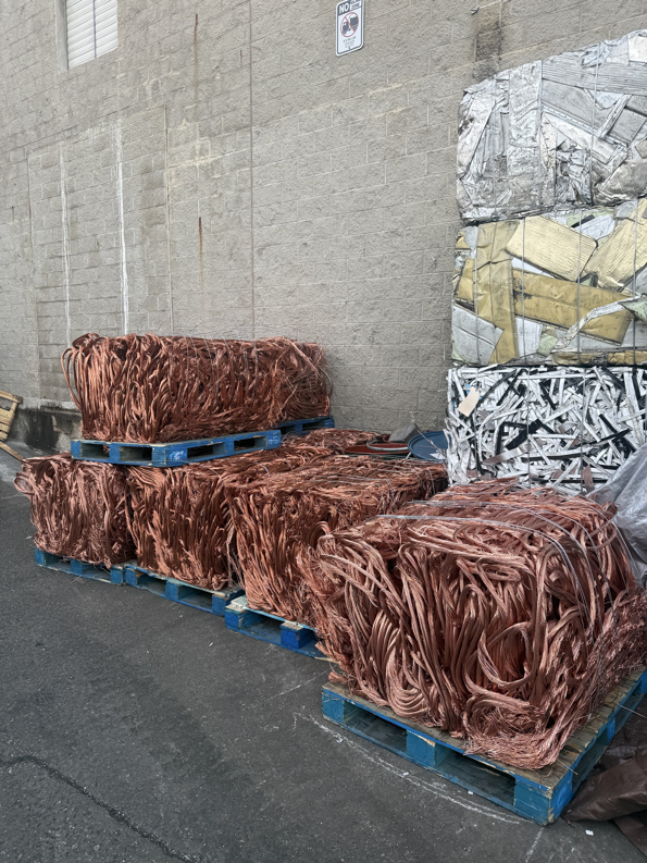 Bales of copper wire and other scrap metal ready for recycling at All American Alloys and Recycling Inc. in Elizabeth, NJ.