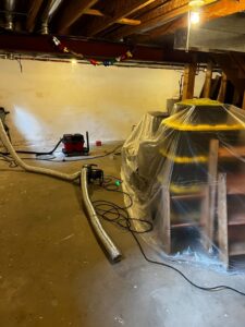 Basement drying and mold remediation equipment in use by ARK Basement Services - Erie, PA
