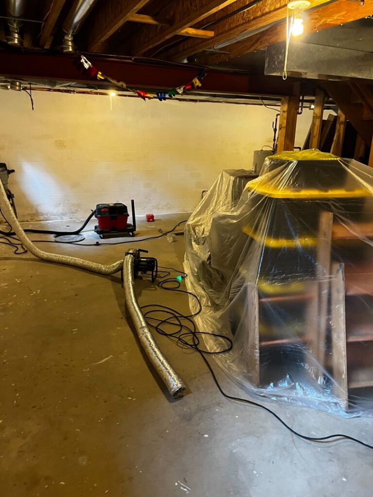 Basement drying and mold remediation equipment in use by ARK Basement Services - Erie, PA