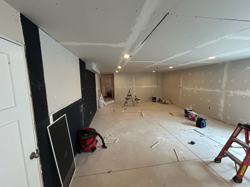Basement drywall installation and finishing in progress by Justin-case Repairs in Ankeny, IA.