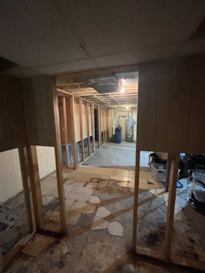 Interior framing for a basement renovation project by Pinnacle Roofing & Construction LLC in Elkhart, IN.