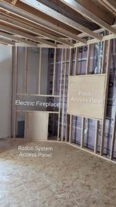 Basement framing for electric fireplace, access panel, and radon system by RC Handyman Services in Council Bluffs, IA.