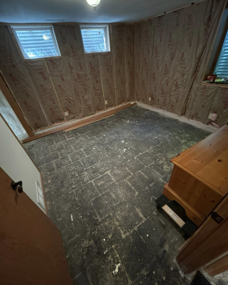 Basement walls with new insulation installed by I Need a Guy Handyman Services LLC in Moorhead, MN