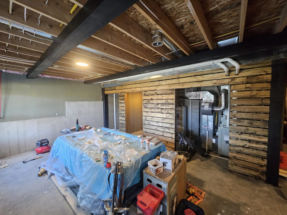 Basement renovation in progress with tools and materials by This and That Handyman and Home Wellness in Olathe, KS.