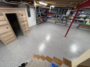 A clean and durable floor coating in a basement storage area, provided by Egli Coating Solutions handyman in Evansville, IN.