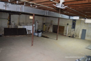 Basement utility area with new ductwork installation and electrical panel by Salas Enterprises, Inc in Elgin, IL.