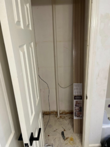 Bathroom closet or alcove during renovation, with exposed walls and materials by JTL Contracting Services LLC in Inver Grove Heights, MN