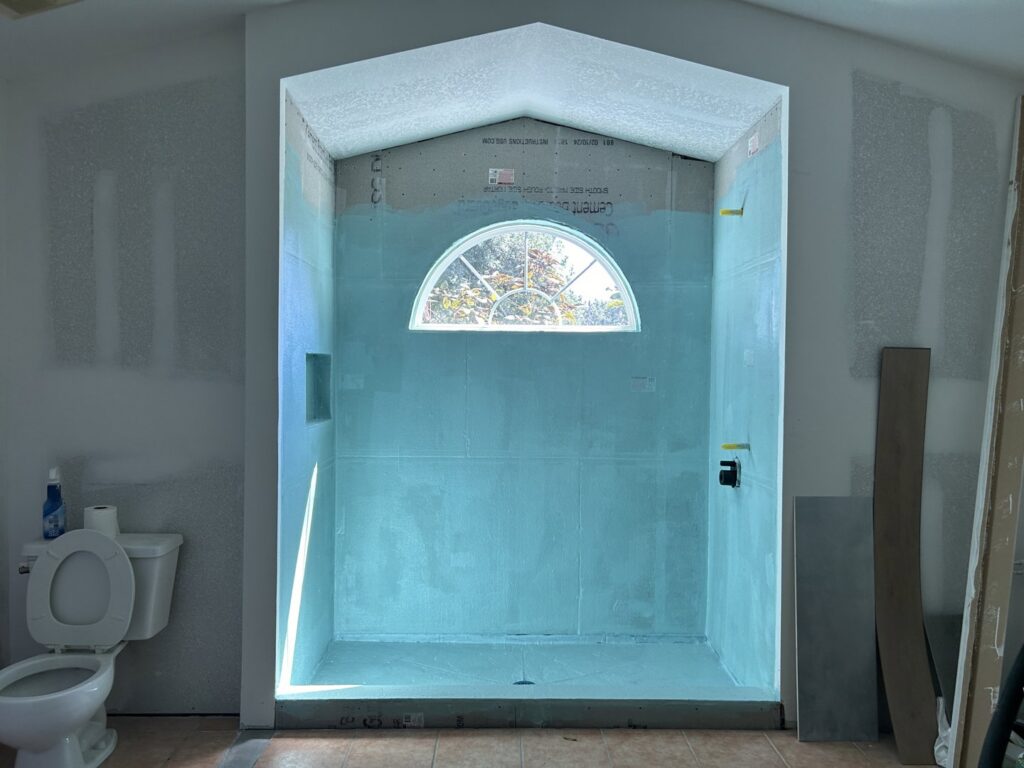 Bathroom demolition phase during a renovation project by Modern Construction Group Inc. in Orlando, FL.