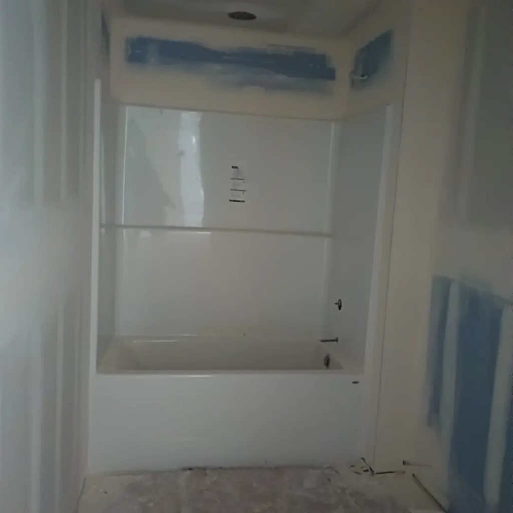 Bathroom drywall installation around a new bathtub, a handyman service by JLSL Drywall LLC in Salem, OR.