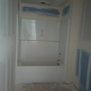Bathroom drywall installation around a new bathtub, a handyman service by JLSL Drywall LLC in Salem, OR.