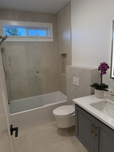 A modern bathroom with new fixture installation by Swiss Construction in Medford, OR