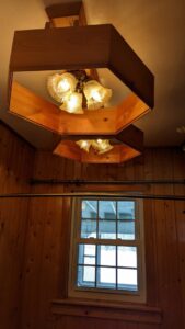 Decorative light fixtures installed in a renovated bathroom by Devil Dog Services LLC in Billings, MT.