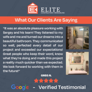 A beautifully remodeled bathroom with a new vanity, mirror, and bathtub by Elite Construction + Remodeling in Spokane, WA.